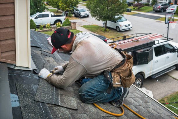 Professional Roofing technician working in Goodrich, TX